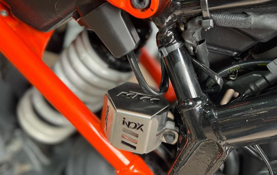 PROTECTOR DE BOMBA FRENO TRASERO KTM